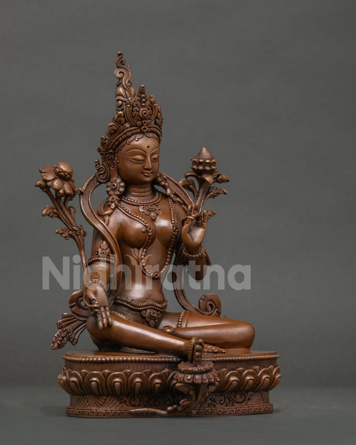Green Tara Statue oxidized copper, right side view showing varada mudra hand