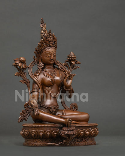 Green Tara Statue oxidized copper, right side view showing varada mudra hand