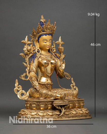 Green Tara statue right side view, elegant posture with symbolic hand gestures and lotus throne