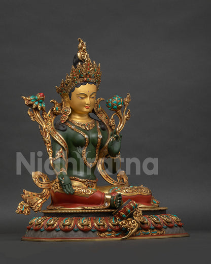Green Tara statue right side view showing utpala lotus hand and ornamental details