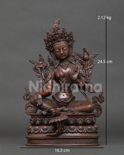 Green tara statue seated in lalitasana on handcarved double lotus pedestal.