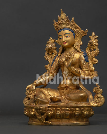 Green Tara Statue Seated on Lotus Pedestal with Vajra Carving Side View.