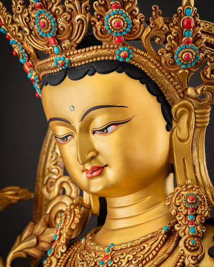 Green Tara statue showing a serene gold-painted face, detailed 3D carvings and radiant gold gilded copper sculpture craftsmanship from Nepal