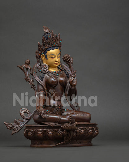 Green Tara Statue showing Varada Mudra and Abhaya Mudra details.