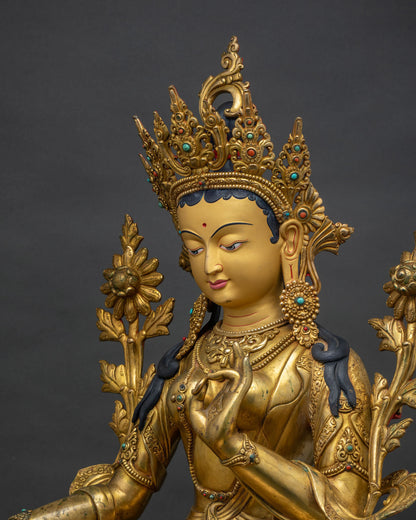 Green Tara Statue side close up, detailed crown, jewelry and robe carving