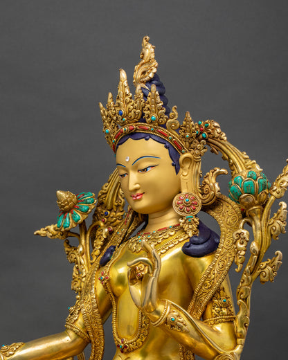 Green Tara Statue side close-up, Utpala flower and Varada Mudra detail