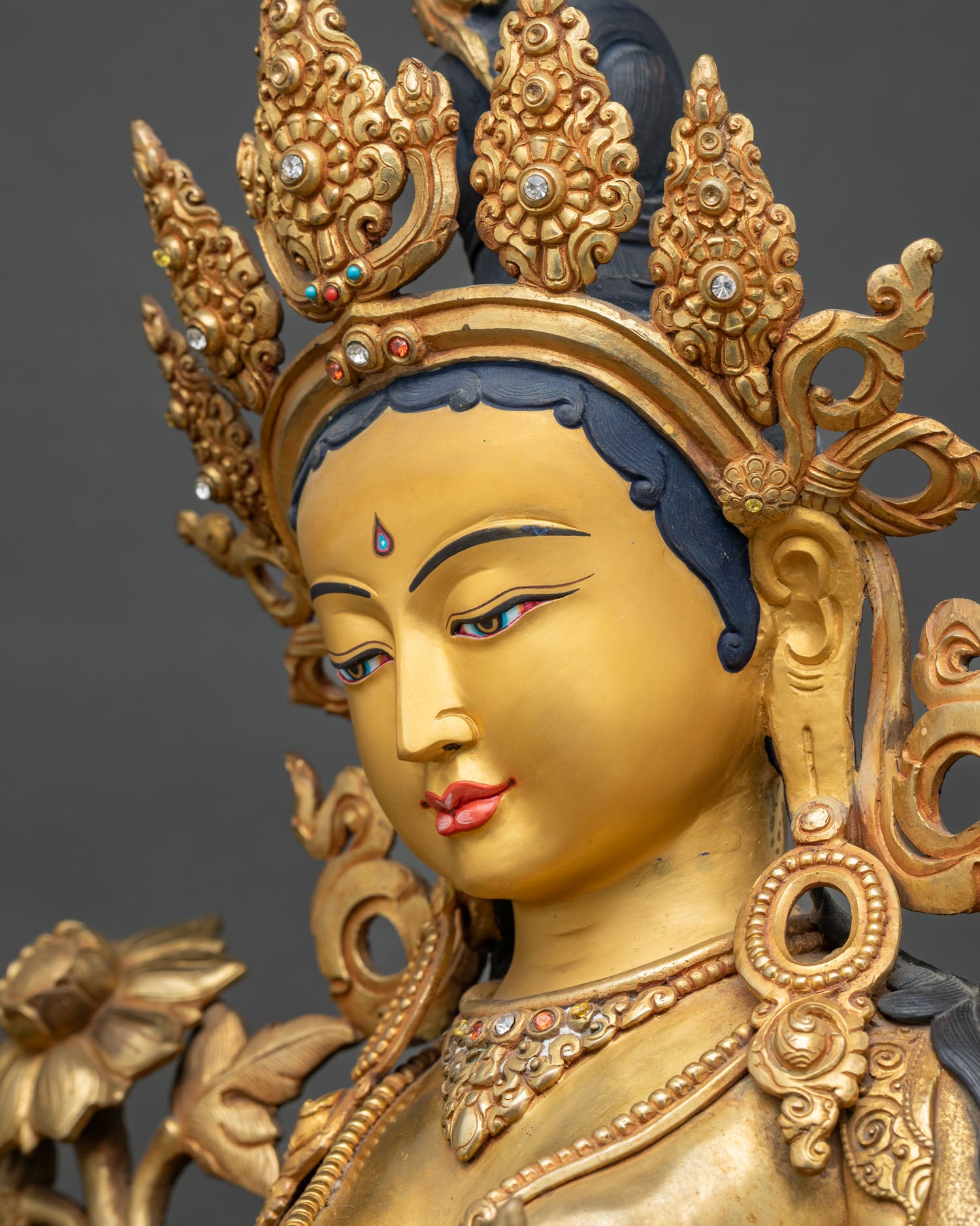 Green Tara Statue side face close-up – gold-gilt crown and jewelry detailing