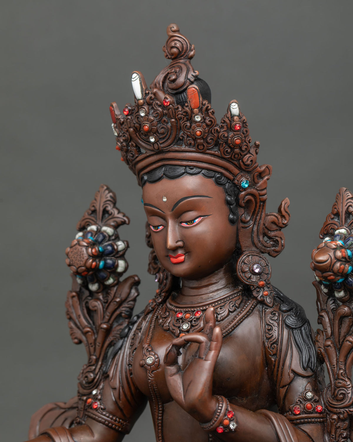 Green Tara Statue side face detail utpala lotus crown necklace copper artwork.