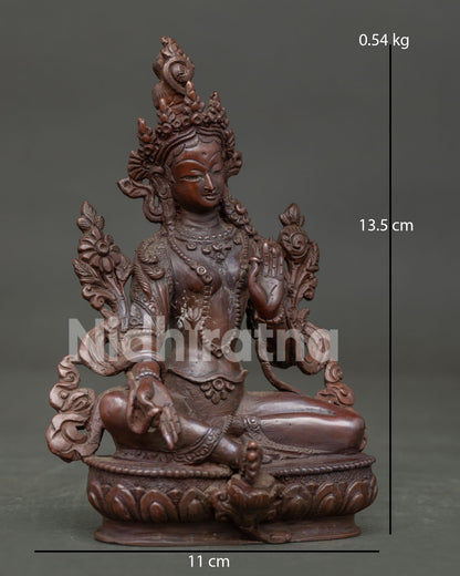 Green Tara Statue with blue utpala lotus and intricate Newari craftsmanship.