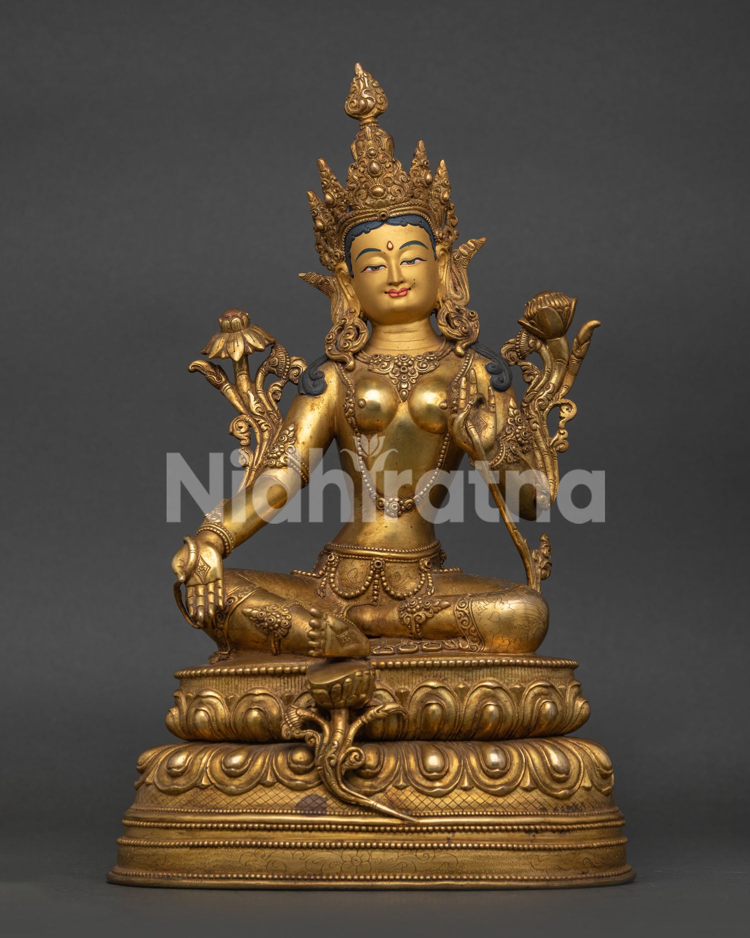 Green tara statue with gold fire gilding and double lotus seat.