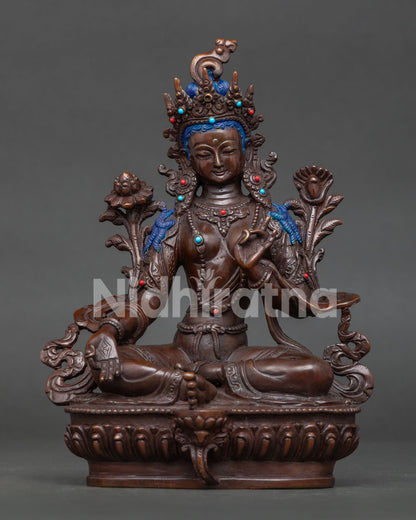 Green Tara statue with traditional Newari craftsmanship and oxidized copper finish
