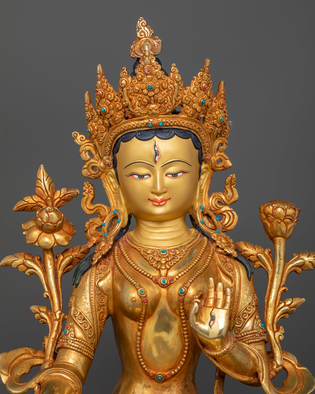 24 karat pure gold coated face of white tara statue