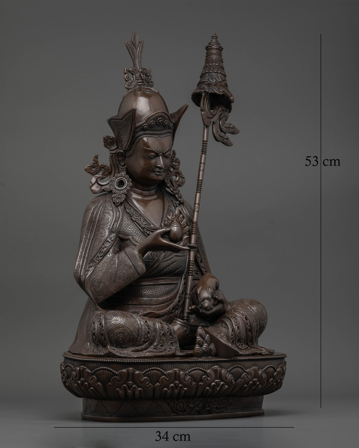 Guru Norlha Buddhist wealth deity statue with mongoose and citron fruit