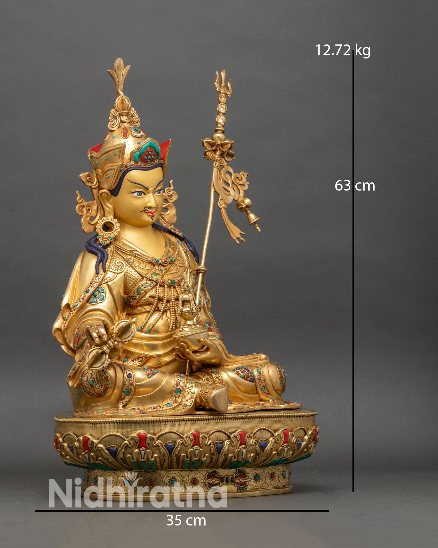 Guru Padmasambhava statue right profile lotus pedestal semi-precious stone details