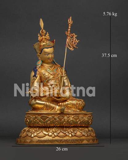 Guru Rinpoche Buddhist Statue, holding vajra, kapala and sacred khatvanga staff detail