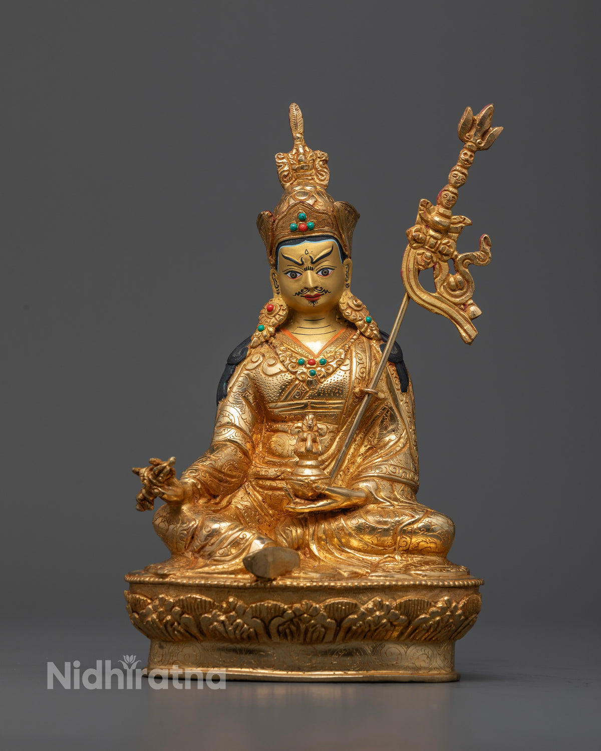 Guru Rinpoche copper statue with gold gilding and semi-precious stone decorations
