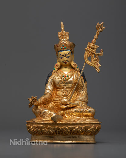 Guru Rinpoche copper statue with gold gilding and semi-precious stone decorations