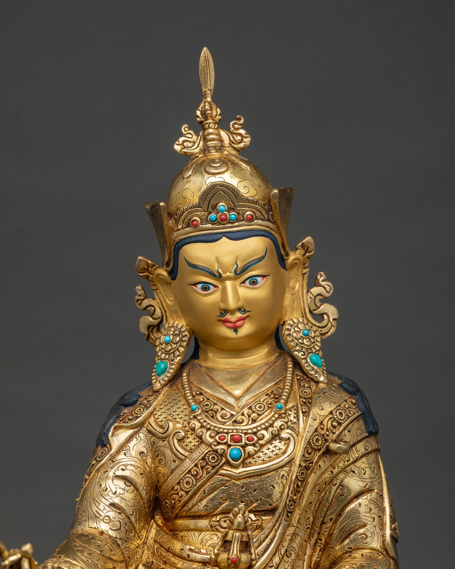 Guru Rinpoche Gold Painted Face Close Up with Red Lotus Hat and Vajra.