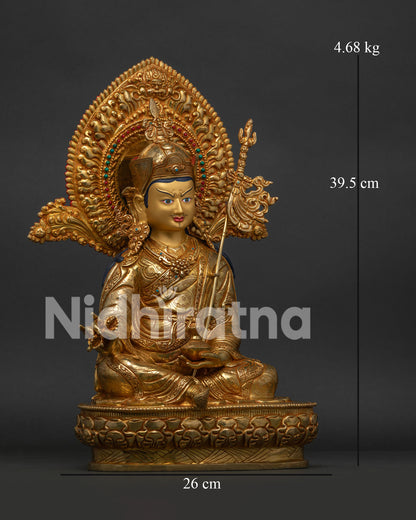 Guru Rinpoche Padmasambhava seated on lotus pedestal holding vajra and skull cup.
