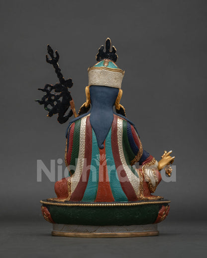 Guru Rinpoche Padmasambhava statue back view showing detailed copper craftsmanship and robes