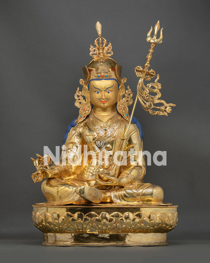 Guru Rinpoche Padmasambhava statue front view with gold gilded copper craftsmanship and lotus throne details