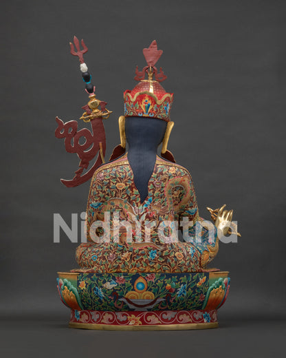 Guru Rinpoche statue back view displaying ornate robes and finely detailed lotus throne craftsmanship
