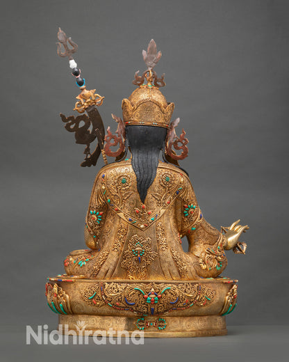 Guru Rinpoche statue back view intricate hand carved copper coral turquoise accents altar meditation decor sculpture