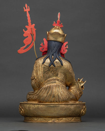 Guru Rinpoche Statue Back View with Hand Carved Garment and Copper Craftsmanship.