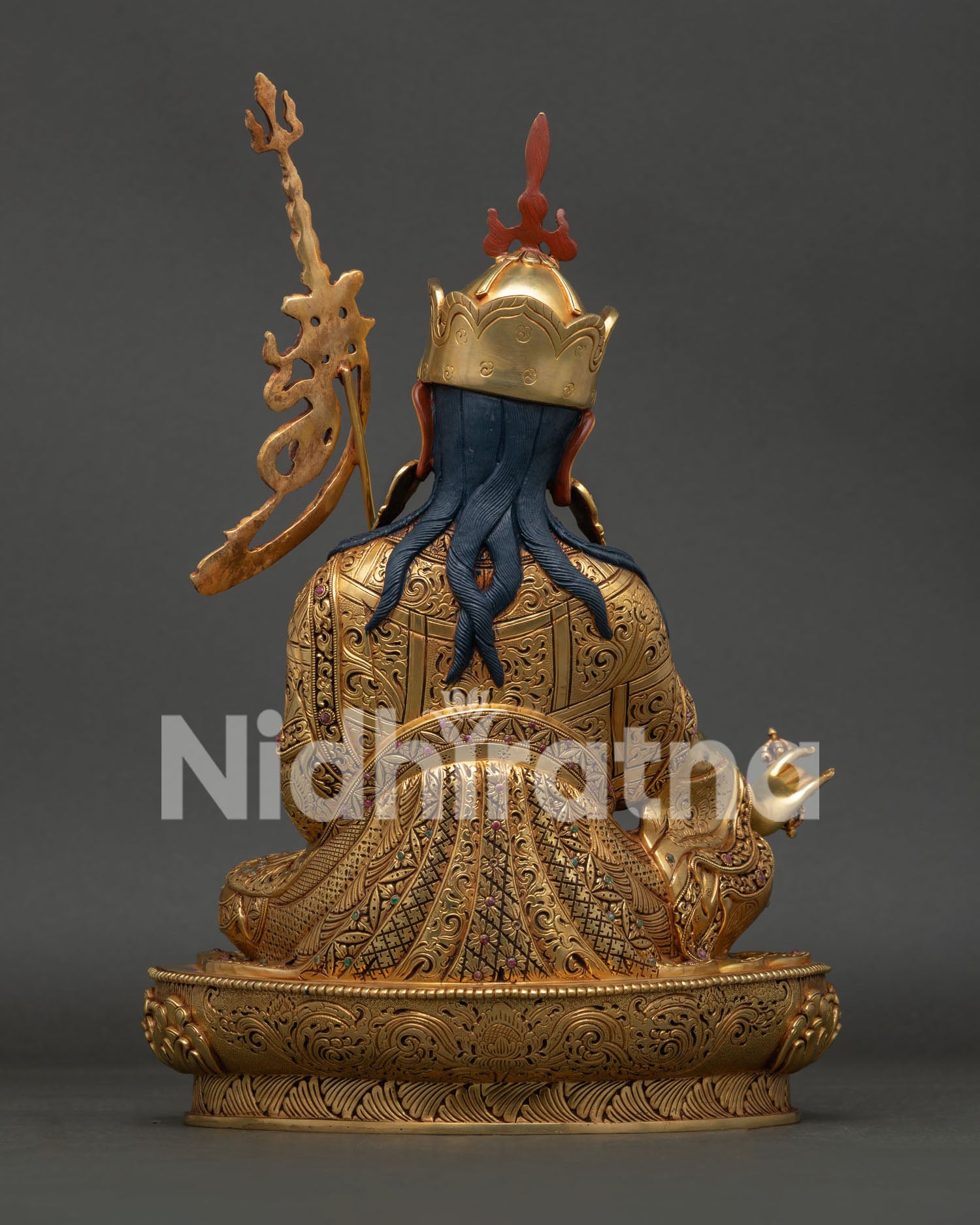 Guru Rinpoche Statue back view with intricate handcrafted copper carvings