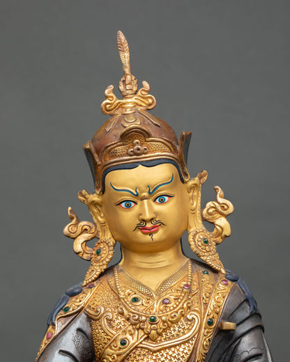 Guru Rinpoche statue close up detail vajra skull cup nectar khatvanga staff lotus hat feather Tibetan Buddhist tantric master art