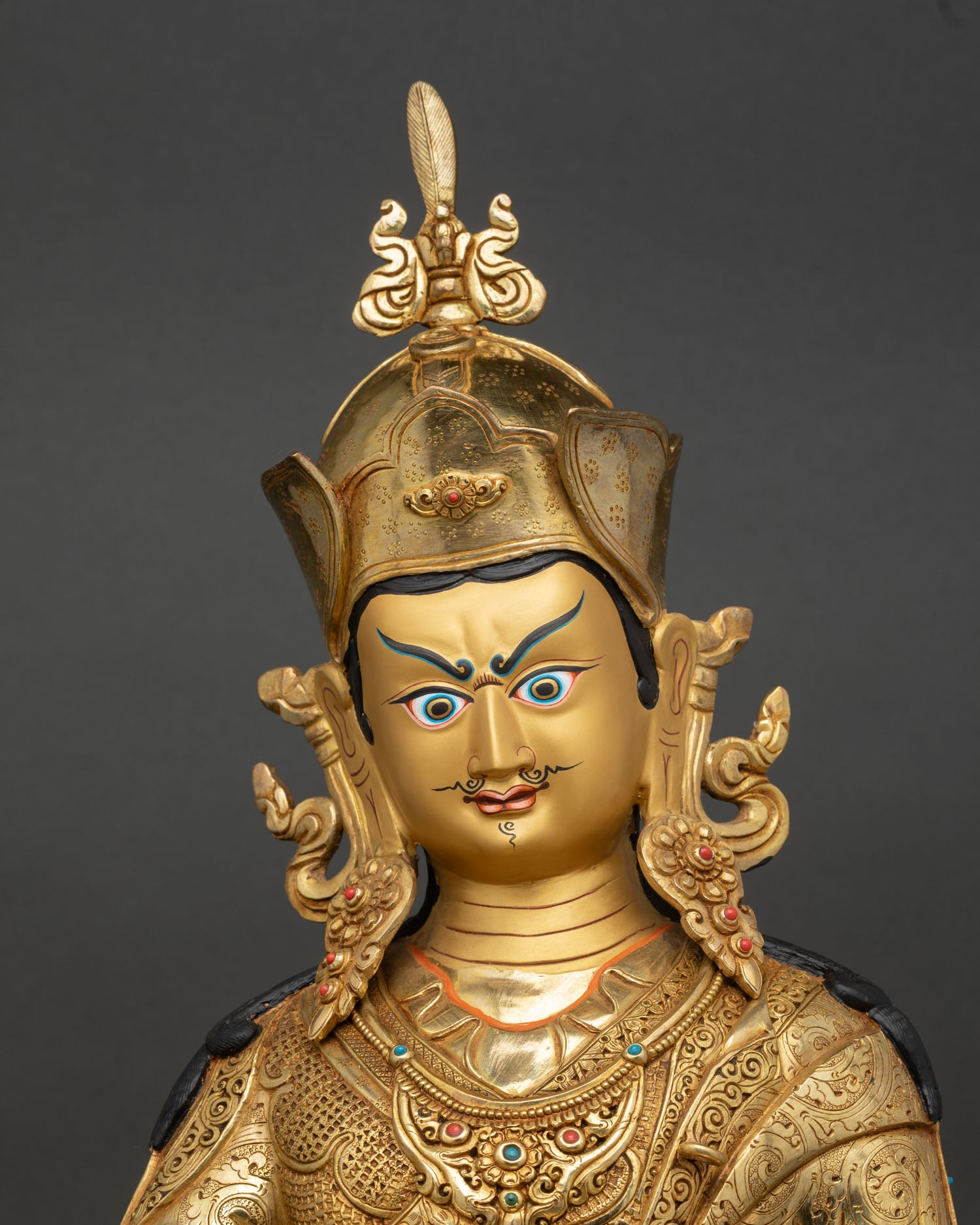 Guru Rinpoche Statue close up gold gilded copper Buddhist art Nepal
