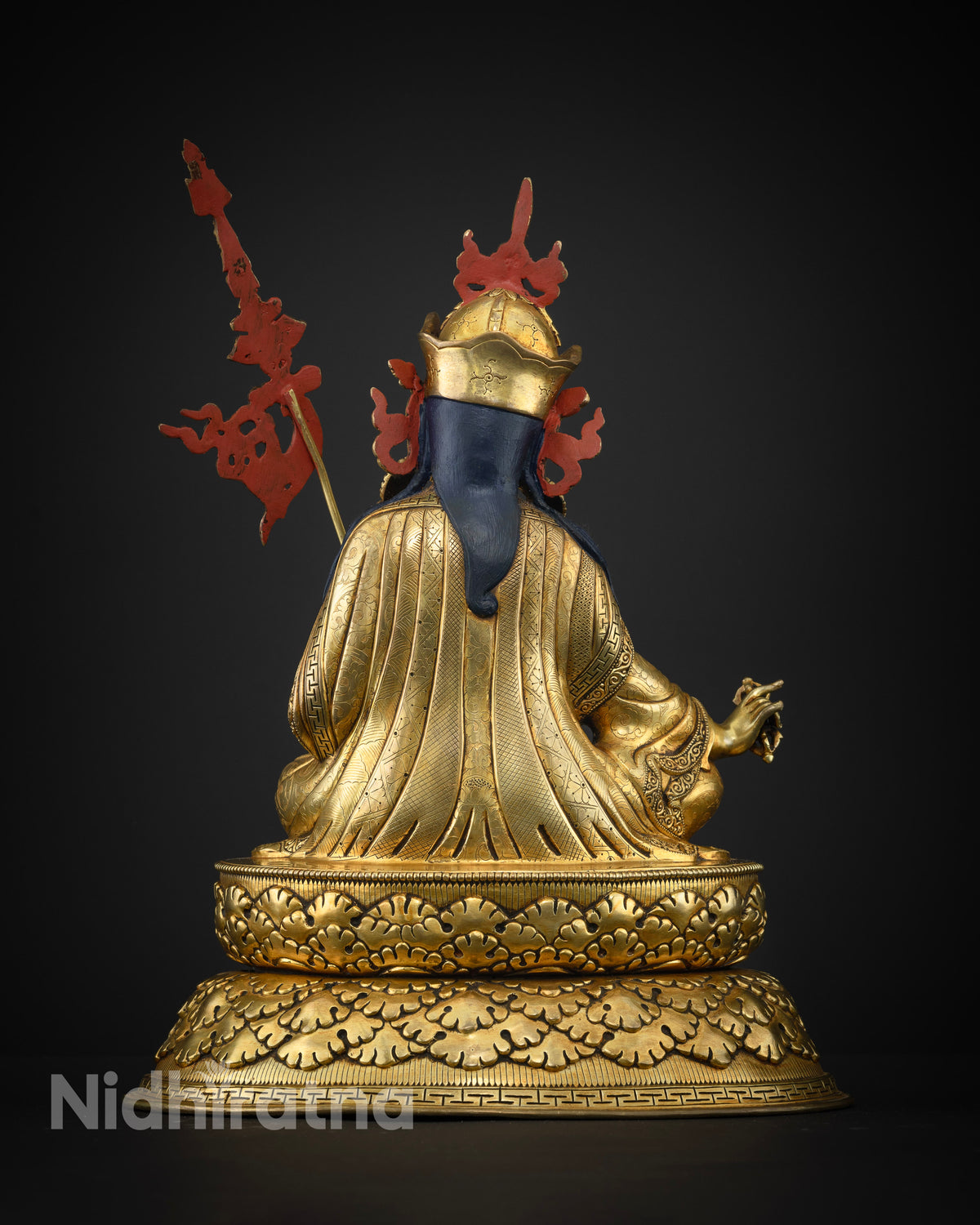 Guru Rinpoche statue copper lotus throne back view.