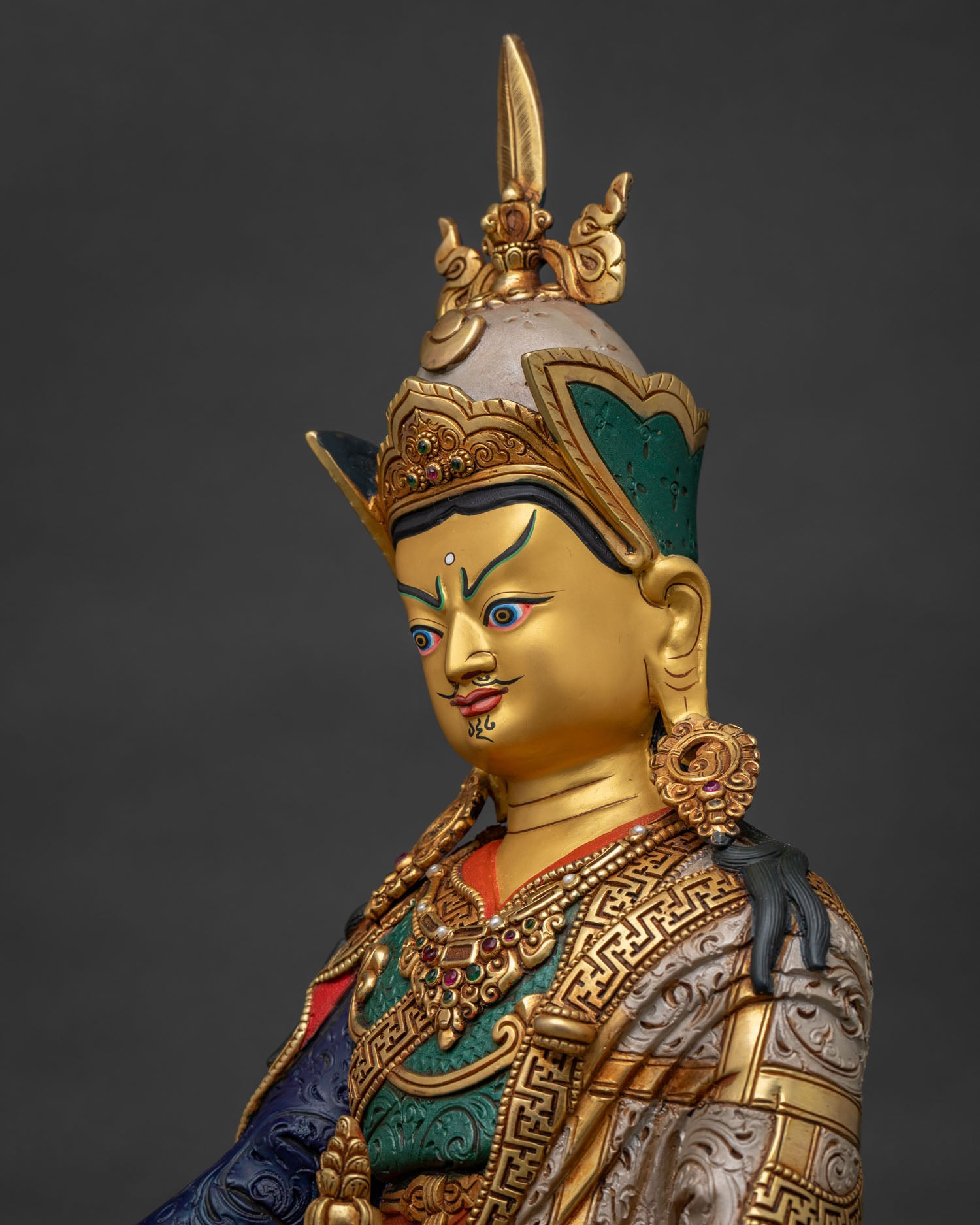 Guru Rinpoche Statue detailed side close up highlighting crown and sacred ornaments