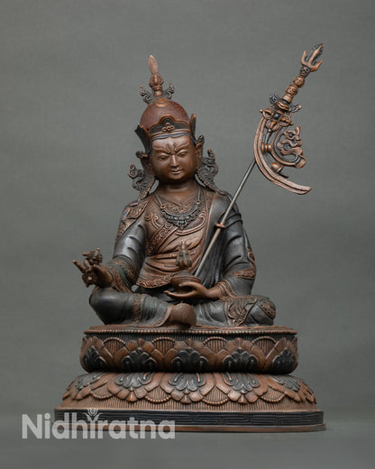 Guru Rinpoche statue front view lotus throne oxidized copper Buddhist deity Nepal Newari craft