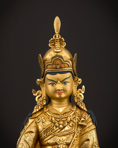 Guru Rinpoche Statue with gold painted face inlaid semi precious stones and floral carvings