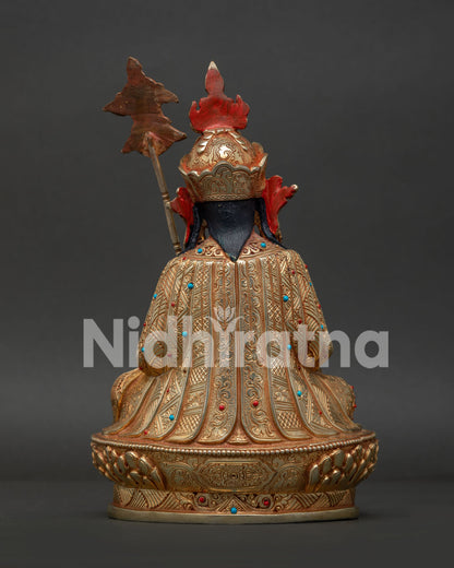 Guru Rinpoche statue handcrafted by Newari artisans from Patan Nepal with 24K gold fire gilding.