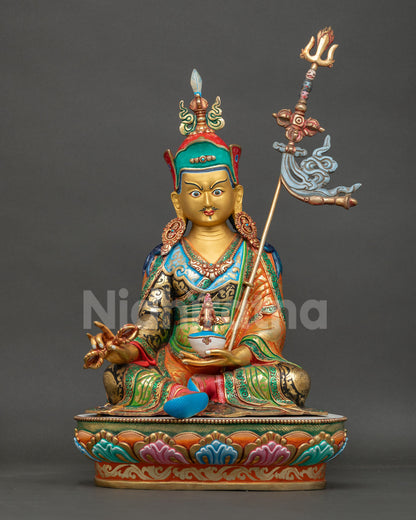 Guru Rinpoche Statu, handmade by a Newari artist from Patan, Nepal, in copper with a 24K gold painted face and sacred Buddhist details