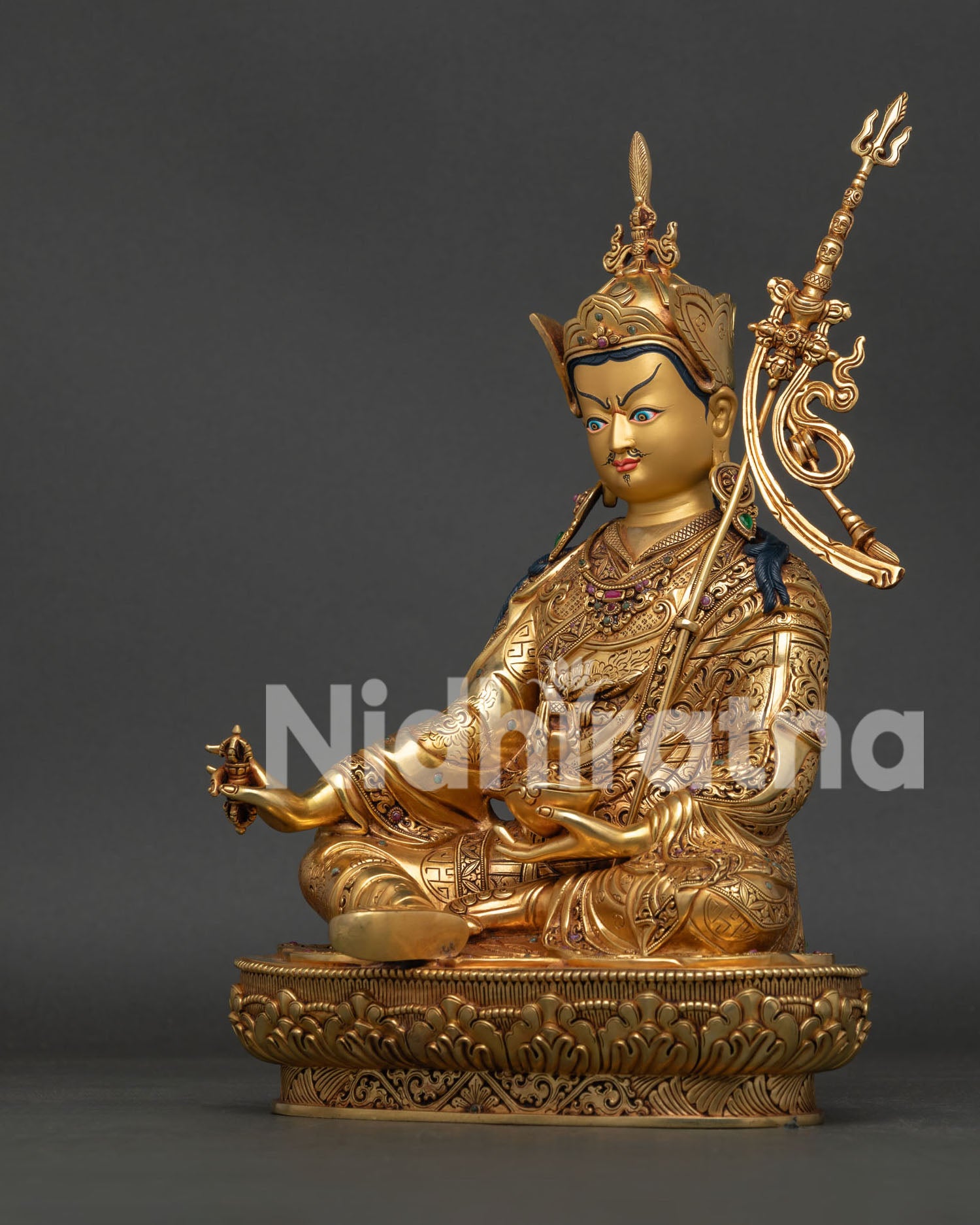 Guru Rinpoche Statue left view side showing Khatvanga trident and robe details