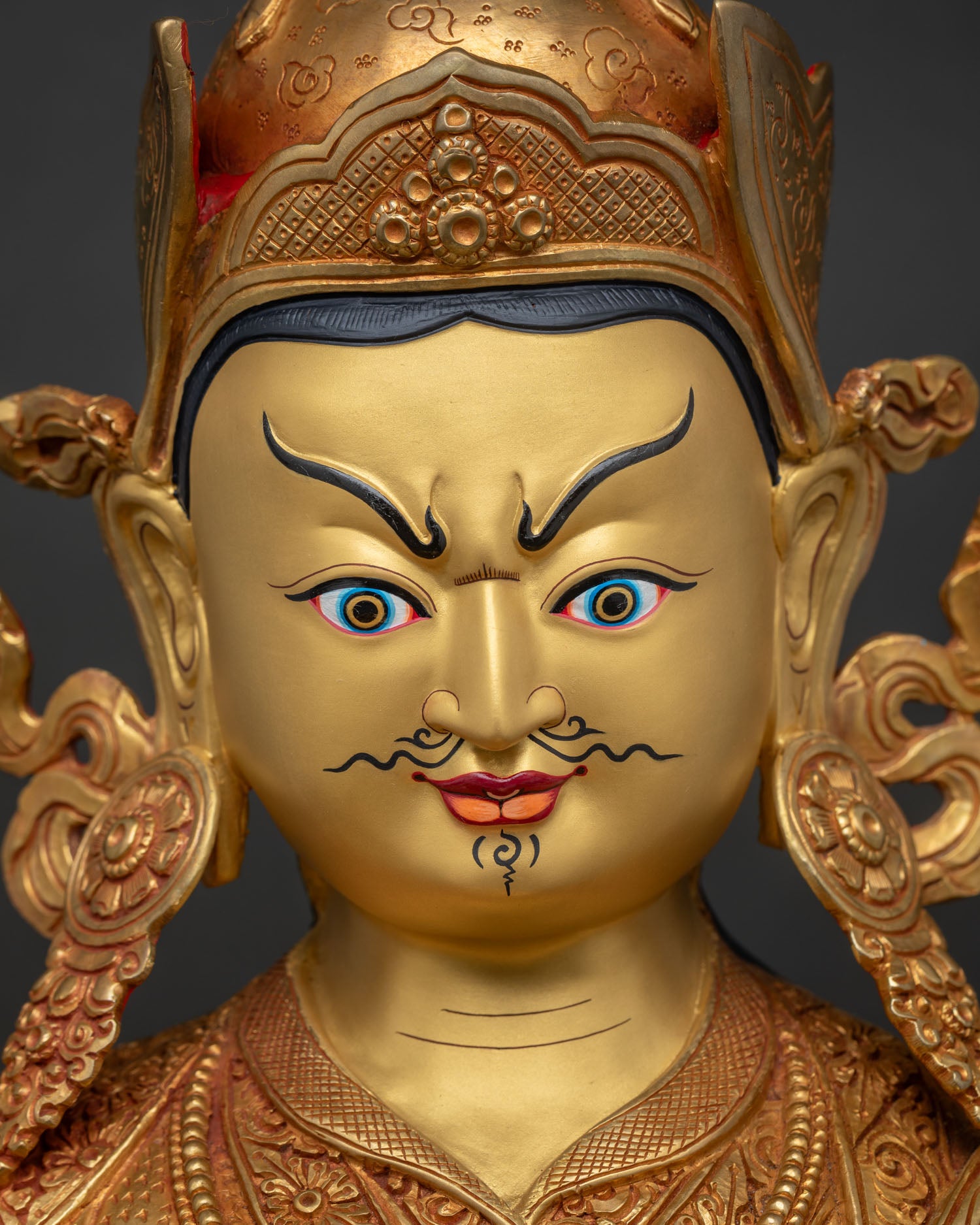 Guru Rinpoche Statue Padmasambhava detailed face close up