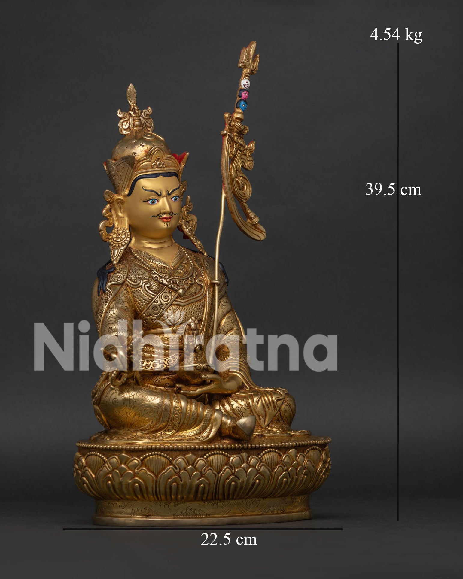 guru rinpoche statue right side view with vajra and khatvanga staff