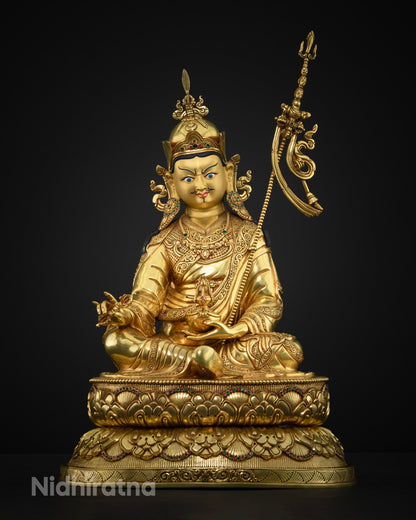 Guru Rinpoche statue showing hand cast copper alloy and gold fire gilding from Nepal