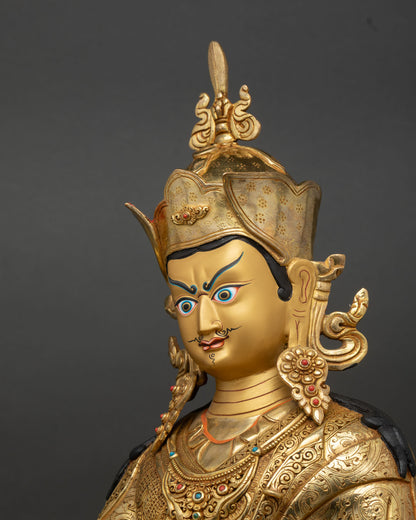 Guru Rinpoche Statue side detail close up lotus base vajra skull cup carving