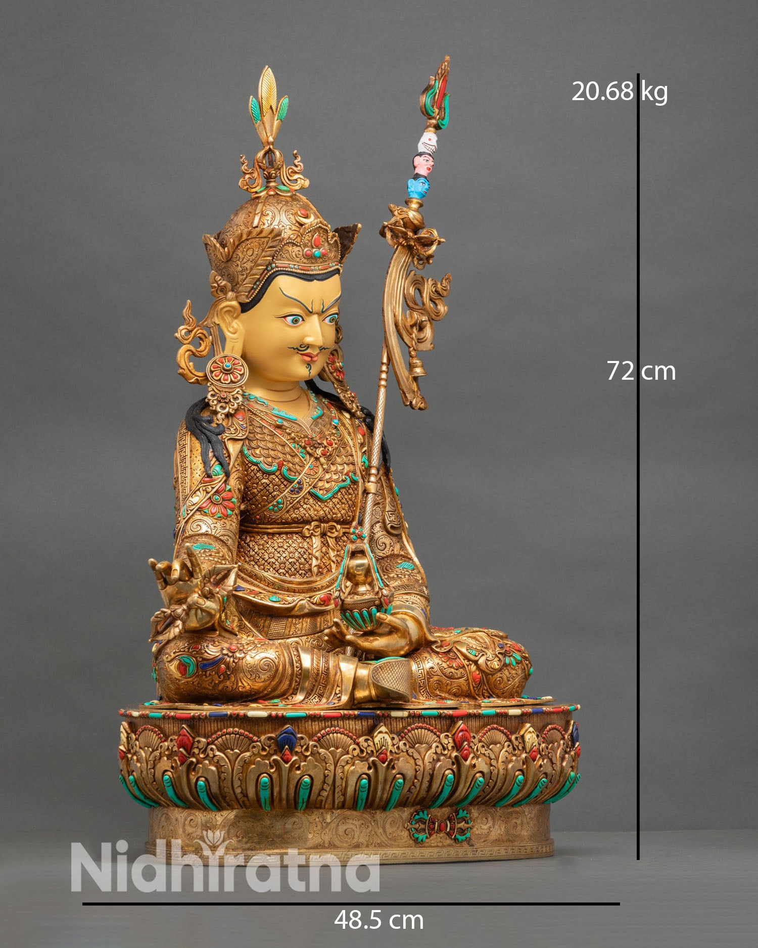 Guru Rinpoche statue side view khatvanga staff seated posture repoussé carving gold gilded copper Nepal statue