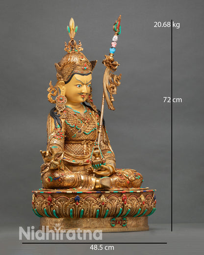 Guru Rinpoche statue side view khatvanga staff seated posture repoussé carving gold gilded copper Nepal statue