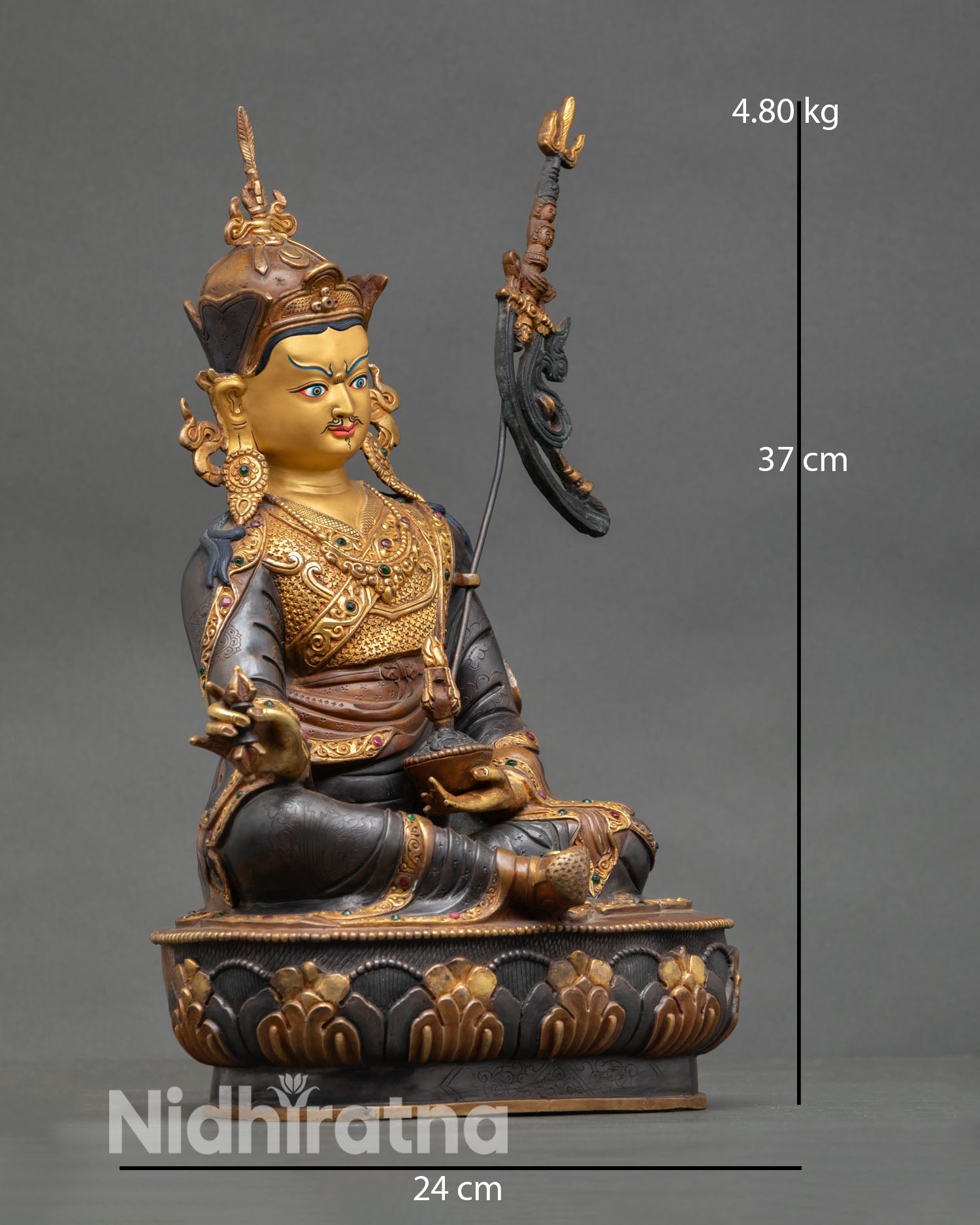 Guru Rinpoche statue side view regal seated posture blooming lotus throne 3D carved robes Himalayan Buddhist meditation sculpture