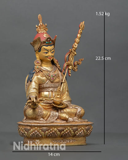 Guru Rinpoche statue side view seated royal ease posture khatvanga shoulder oxidized copper Vajrayana deity meditation sculpture