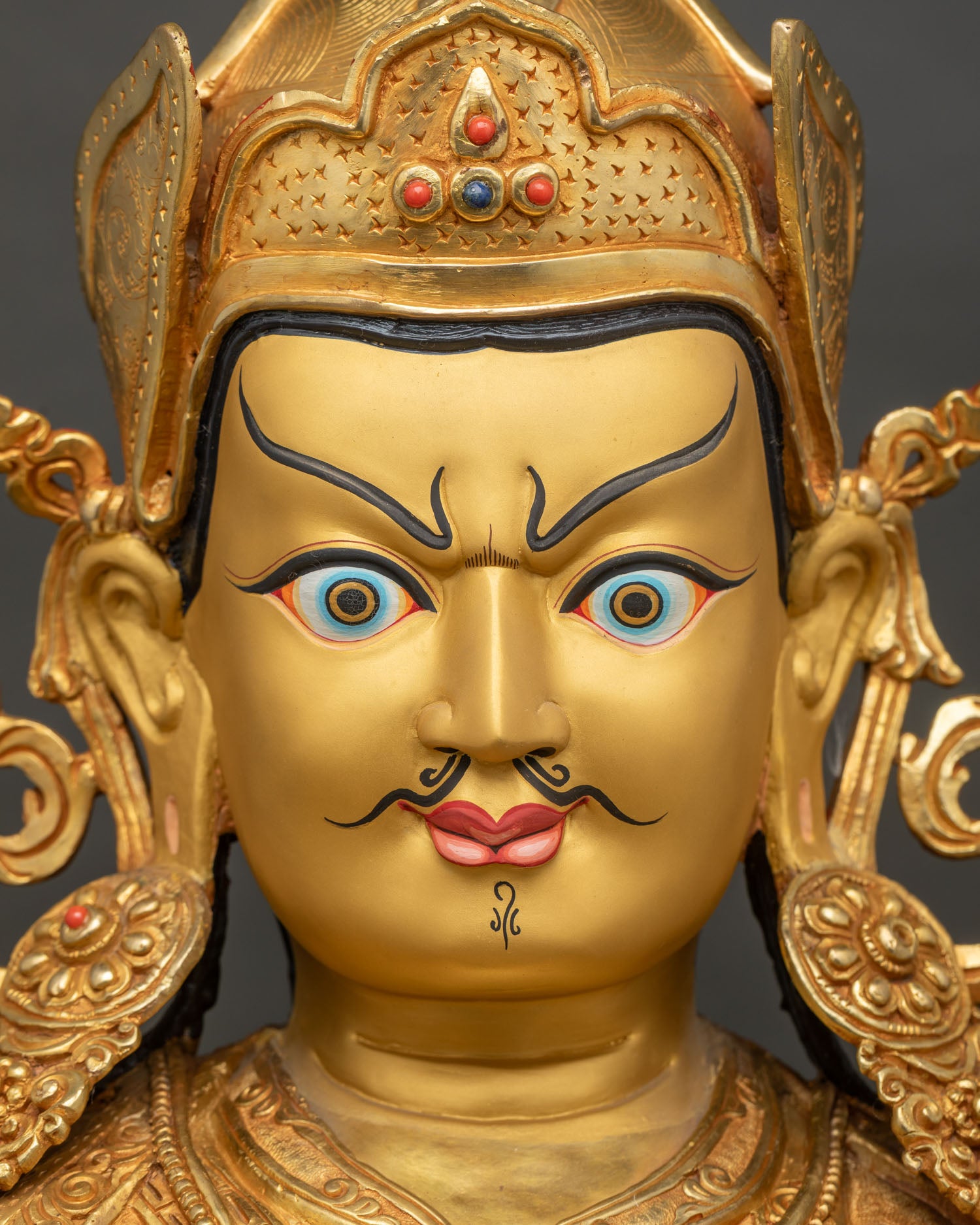 Guru Rinpoche's Gold-Painted Face, Arched Brows and Dignified Mustache, Compassionate Calm