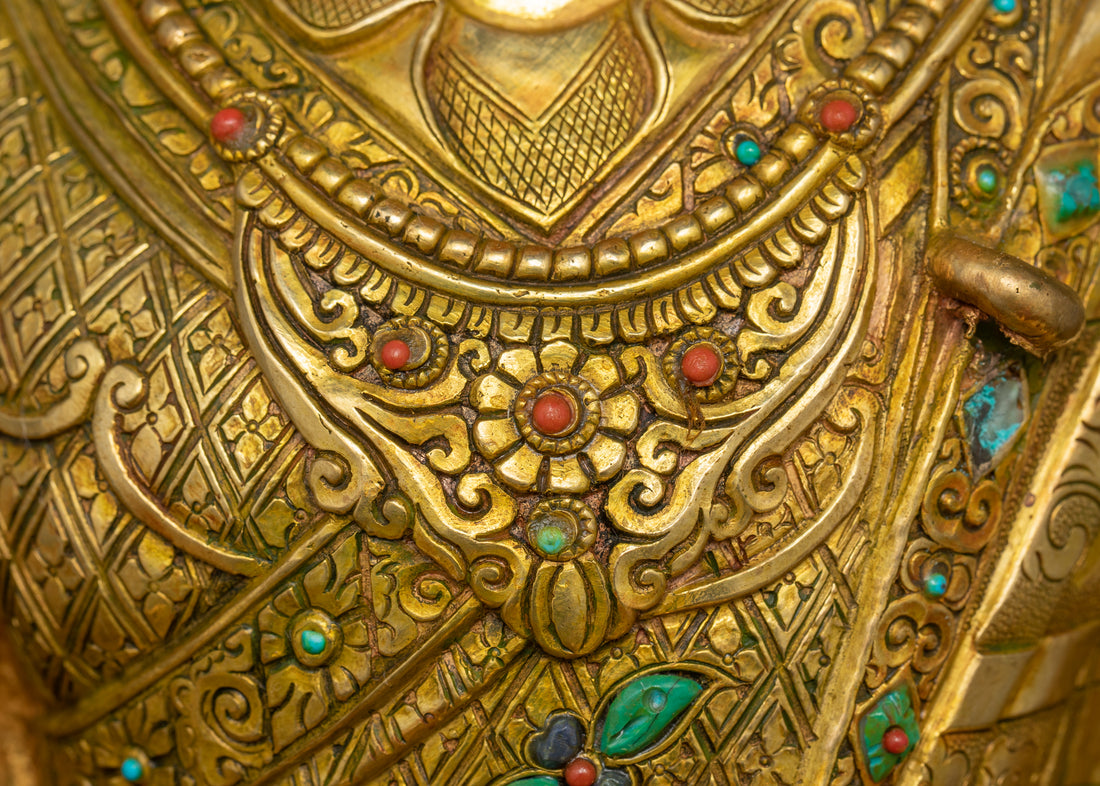 the necklace of guru rinpoche adorned with semi precious gemstones