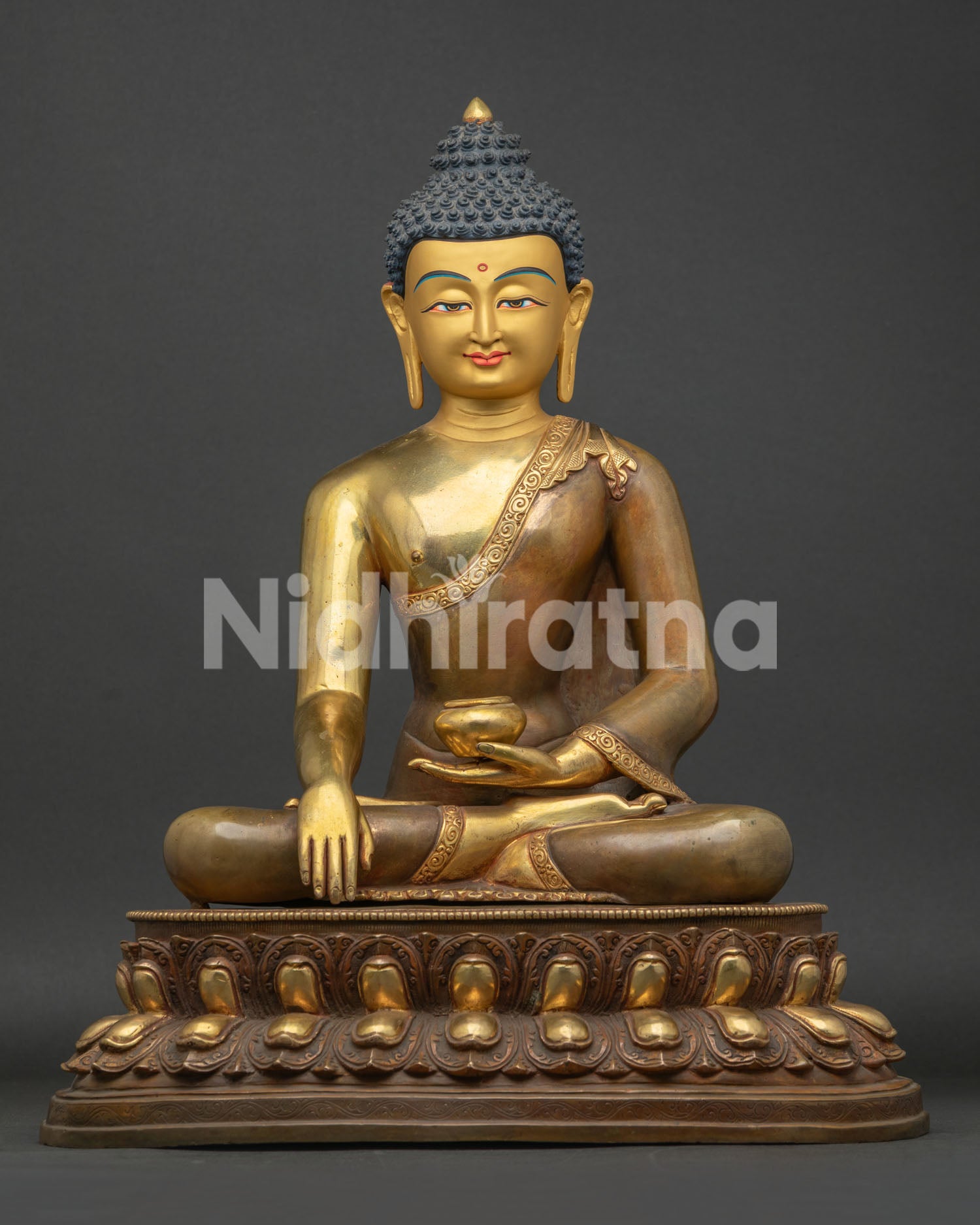 Hand-cast copper Shakyamuni Buddha statue in Bhumisparsha Mudra from Nepal