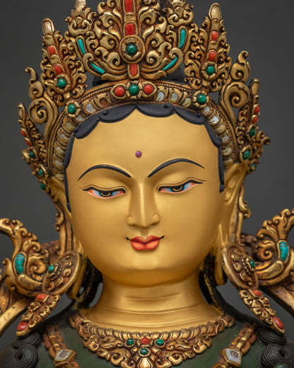 Hand-painted Green Tara face detail serene expression gold crown ornate headdress